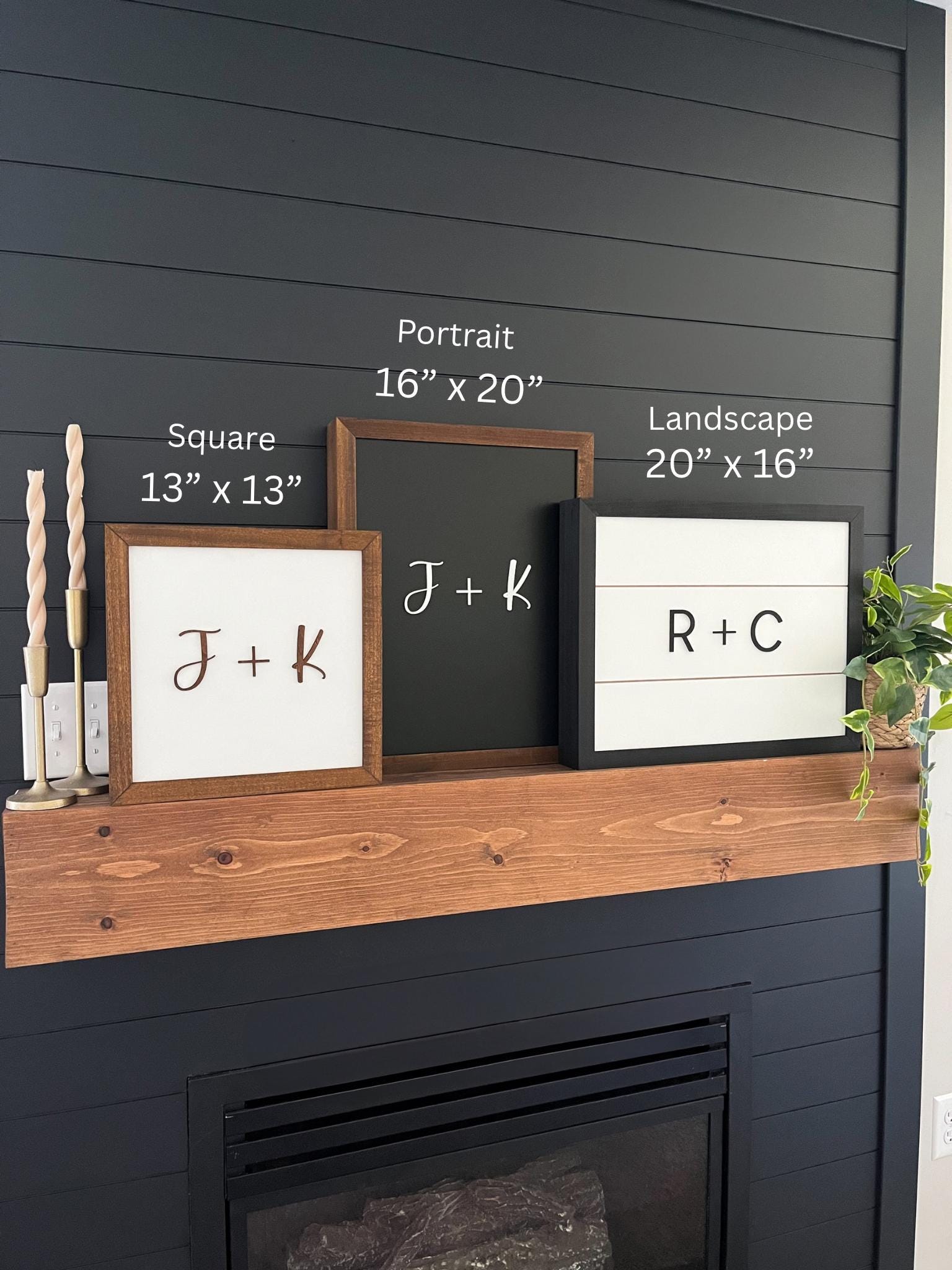 Framed Hidden Gun Art on a wooden mantel against a dark gray wall with fireplace.